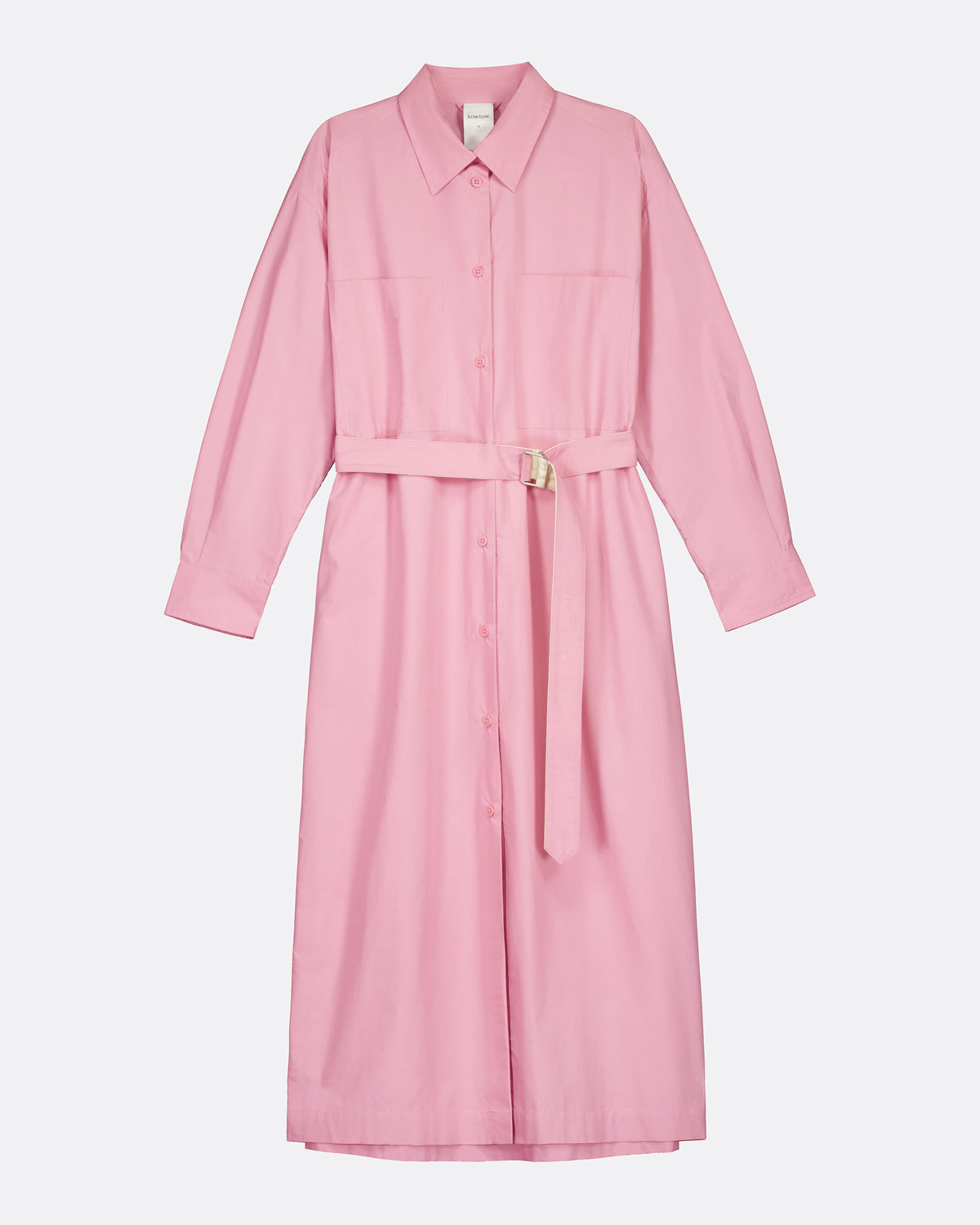 A pink long-sleeve shirt dress with a matching tie belt and a small gold buckle, shown against a plain light gray background.