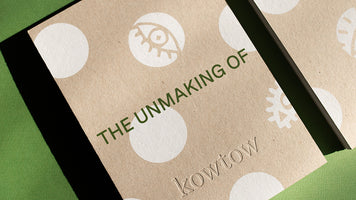 Close up of a book that reads the unmaking of, with Kowtow embossed underneath.