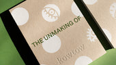 Close up of a book that reads the unmaking of, with Kowtow embossed underneath.