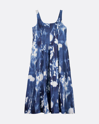 A sleeveless blue and white tie-dye dress with a scoop neckline and thin shoulder straps, shown against a plain light gray background.